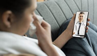 A worried patient using online doctors for a medical consultation, illustrating telehealth risks.